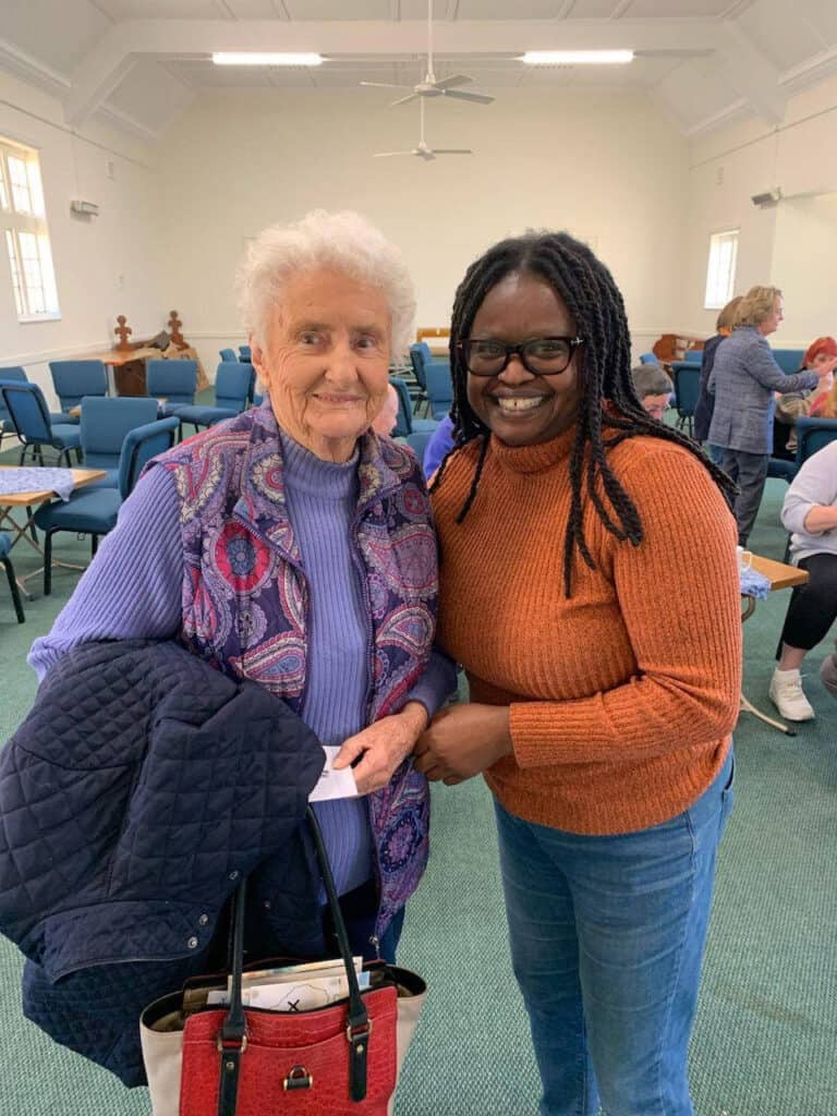 long standing kairos volunteer heather mann with one if our presentation team rev kavee masila.